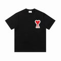 T-shirt noir à logo ami de cœur rouge