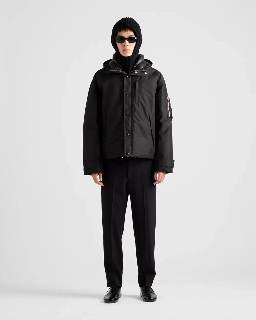 Doudoune à capuche en tissu technique Prada