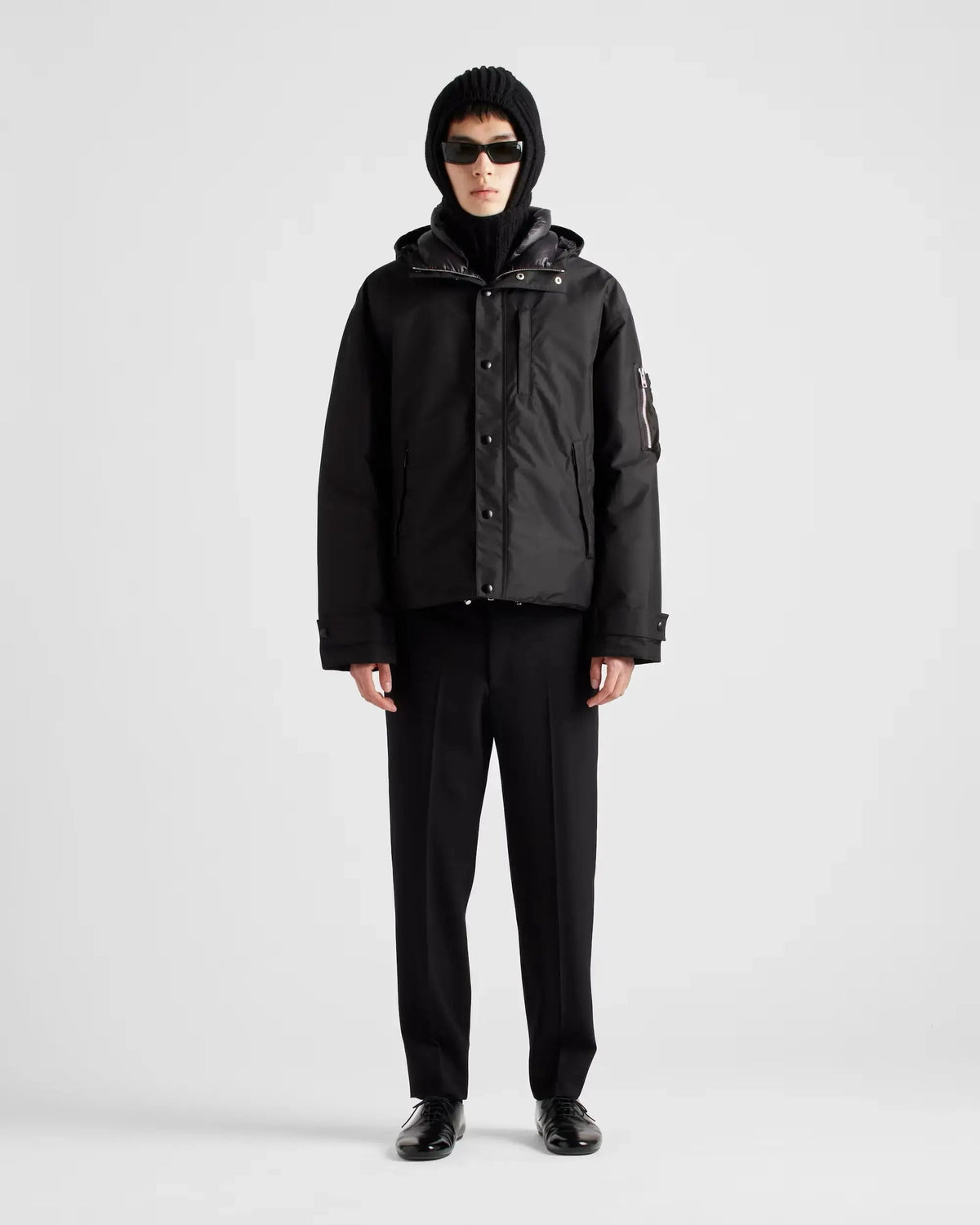 Doudoune à capuche en tissu technique Prada
